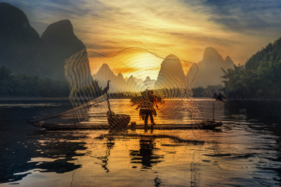 Net Fishing at Sunset